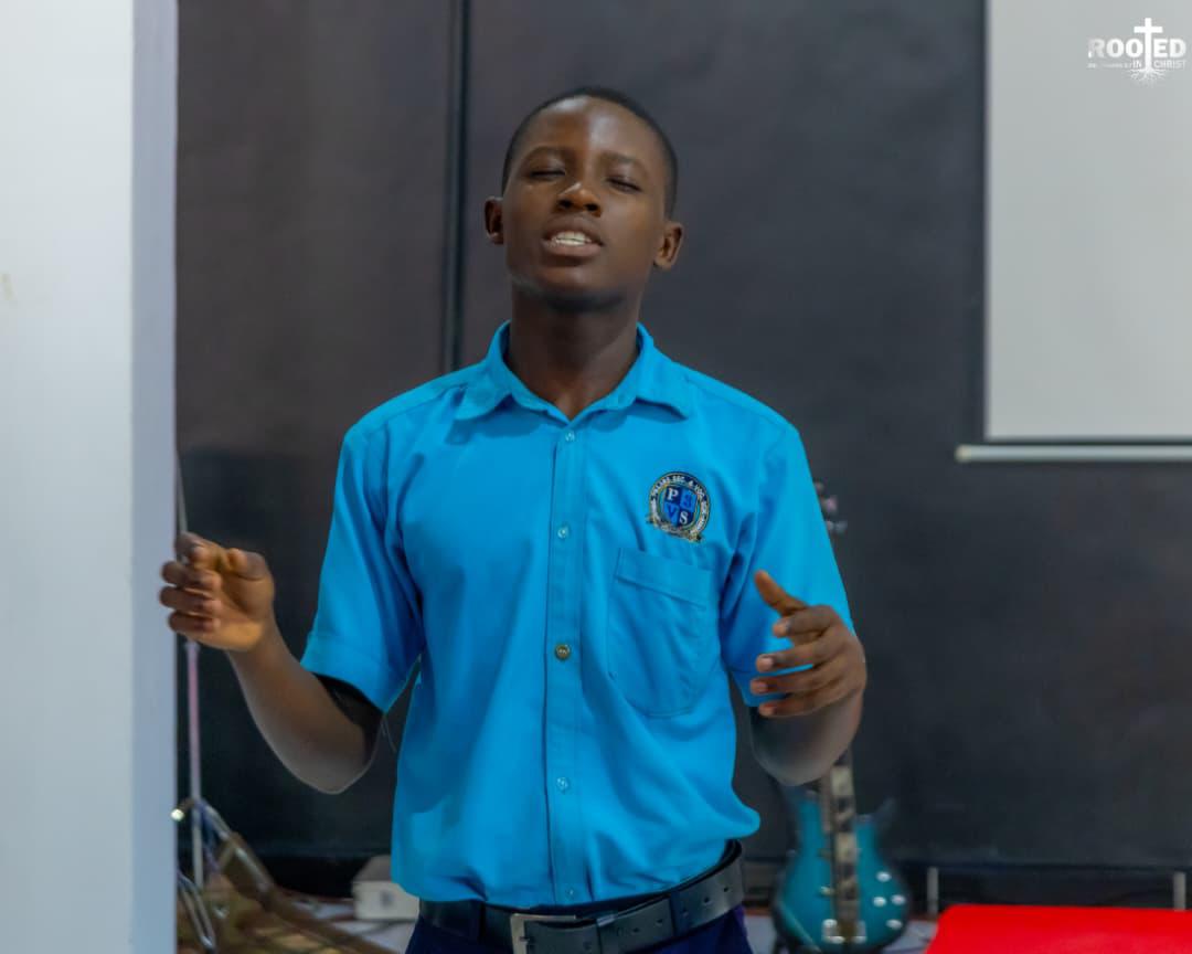 Bible Union student presenting at the front of the room