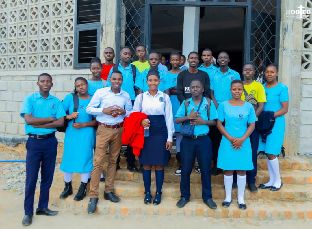 Bible Union members standing together at the school entrance