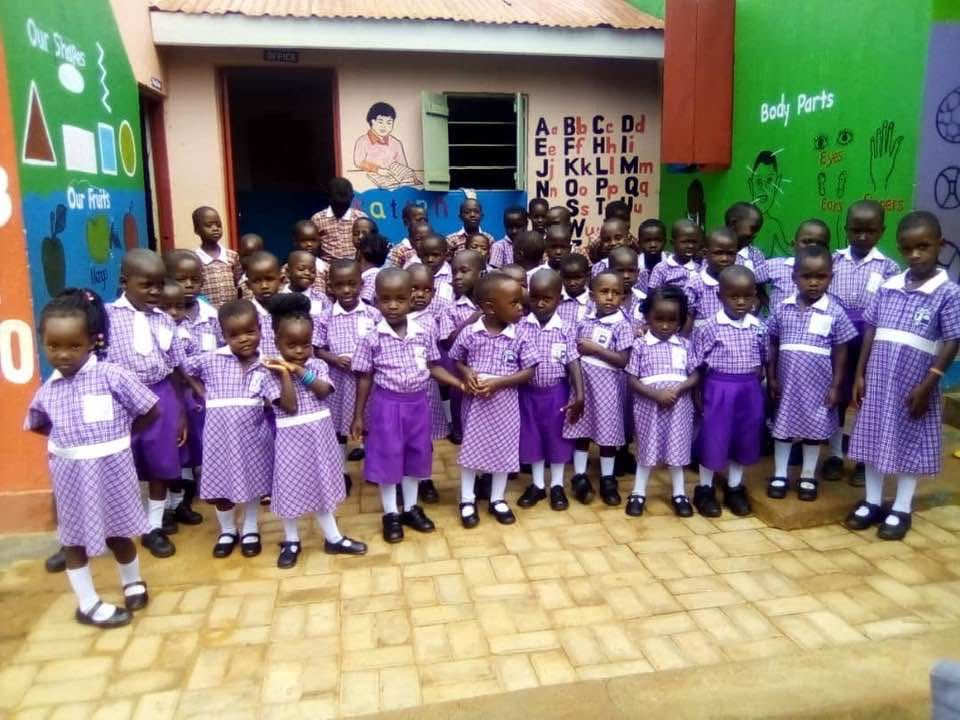 Children in uniform at The Pillars Nursery and Primary School