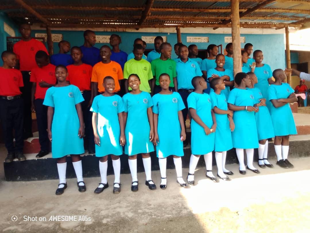 Secondary school students gathered in uniform at school