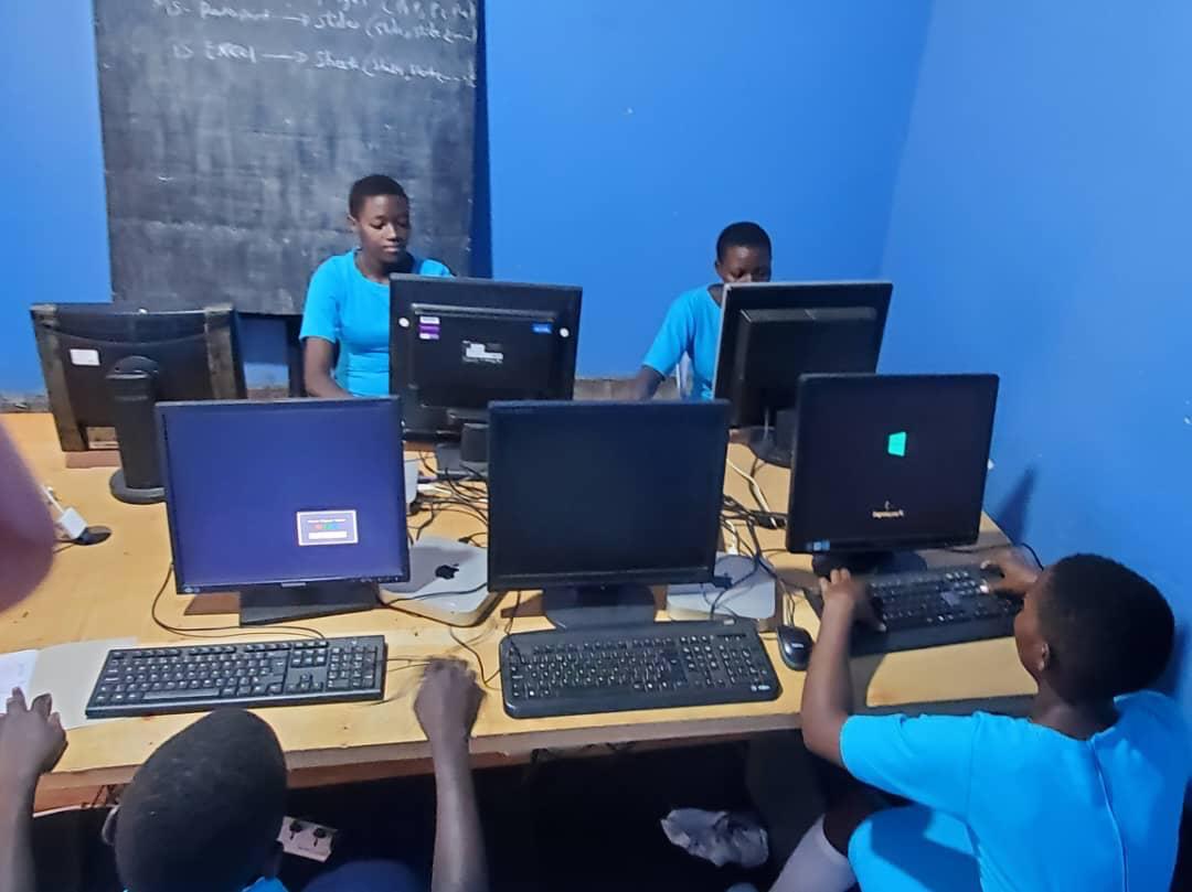 Secondary school learners practicing computer skills