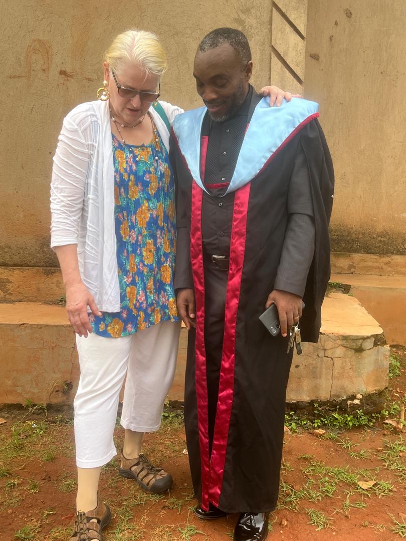 Vocational graduate with a supporter after the ceremony