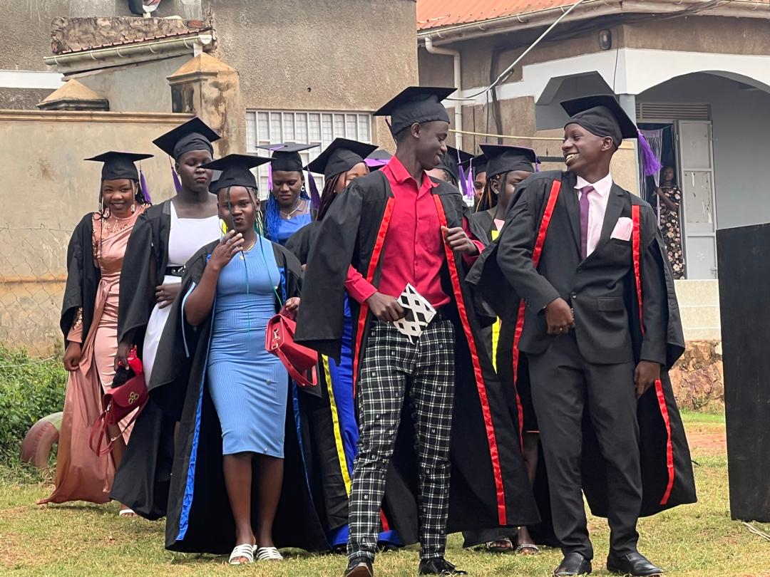 Vocational graduates walking together in gowns